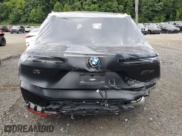 2023 BMW iX M60 with VIN WB533CF0XPCK81841, listed as a Copart auction lot 79402734 with 10,318 mi miles and Salvage Title. Bid and sale history available at carsss.com. Image 6.