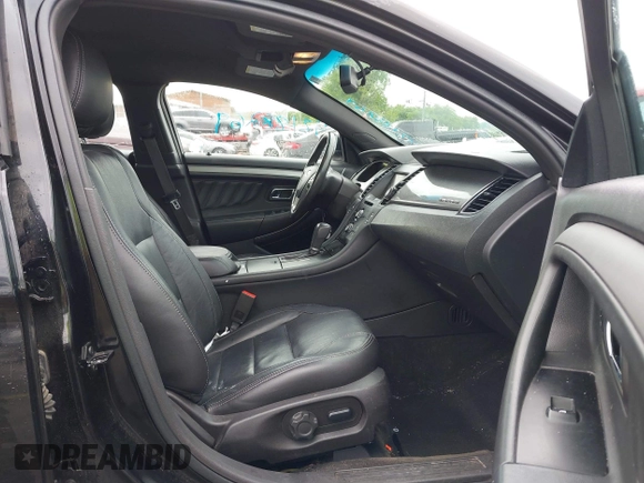 2015 Ford Taurus SEL z VIN 1FAHP2E81FG116032, wystawiony jako IAAI lot #42188269 z przebiegiem 178 774 mil mil oraz . Historia ofert i sprzedaży dostępna na DreamBid. Obrazek 5.