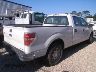 2014 Ford F-150 XL with VIN 1FTFW1CF8EKE24827, listed as a IAAI auction lot 42317684 with 249,558 mi miles and . Bid and sale history available at DreamBid. Image 1.