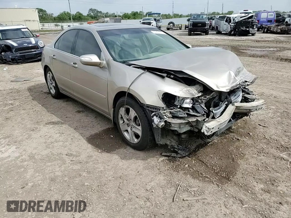 2006 Acura RL z VIN JH4KB16576C008162, wystawiony jako Copart lot #51801115 z przebiegiem Nie podano mil oraz Szkoda całkowita • Salvage title. Historia ofert i sprzedaży dostępna na DreamBid. Obrazek 11.