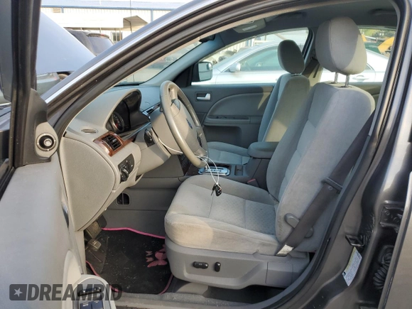 2005 Ford Five Hundred SEL with VIN 1FAFP24175G103683, listed as a Copart auction lot 74348284 with 0 mi miles and Salvage Title. Bid and sale history available at carsss.com. Image 7.