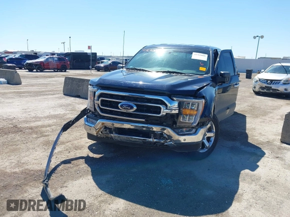 2022 Ford F-150 XL with VIN 1FTFW1E82NKD87353, listed as a IAAI auction lot 41769006 with 69,913 mi miles. Bid and sale history available at carsss.com. Image 6.