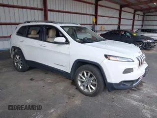 2015 Jeep Cherokee Limited z VIN 1C4PJMDS5FW659728, wystawiony jako IAAI lot #42407127 z przebiegiem 127 503 mil mil oraz . Historia ofert i sprzedaży dostępna na DreamBid. Obrazek 1.