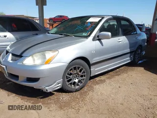 2005 Mitsubishi Lancer ES with VIN JA3AJ26E55U009131, listed as a IAAI auction lot 41980014 with 227,805 mi miles. Bid and sale history available at carsss.com. Image 2.