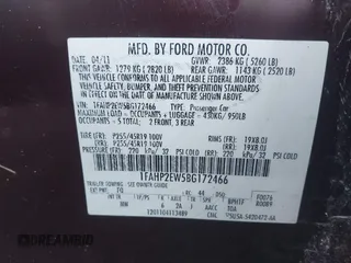 2011 Ford Taurus SEL with VIN 1FAHP2EW5BG172466, listed as a IAAI auction lot 41209469 with 237,178 mi miles. Bid and sale history available at carsss.com. Image 9.