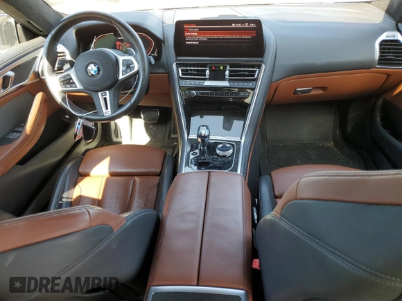 2023 BMW 8 Series M850i with VIN WBAGV8C01PCM79724, listed as a Copart auction lot 69486194 with 14,285 mi miles and Salvage title. Bid and sale history available at DreamBid. Image 8.