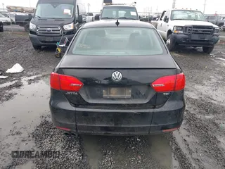 2014 Volkswagen Jetta TDI w/Premium with VIN 3VWLL7AJ1EM406360, listed as a IAAI auction lot 41857580 with 93,333 mi miles and . Bid and sale history available at DreamBid. Image 16.