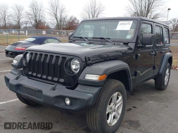 2022 Jeep Wrangler Unlimited Willys Sport with VIN 1C4HJXDN3NW132771, listed as a IAAI auction lot 41052274 with 33,302 mi miles and . Bid and sale history available at DreamBid. Image 2.