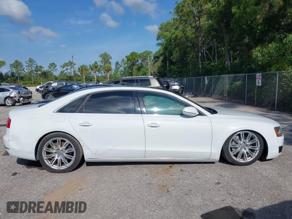 2014 Audi A8 4.0T with VIN WAUR2AFD8EN004371, listed as a IAAI auction lot 42693492 with 159,405 mi miles and . Bid and sale history available at DreamBid. Image 13.