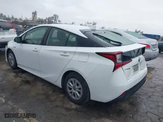 2021 Toyota Prius L Eco with VIN JTDKAMFU6M3141019, listed as a IAAI auction lot 41821212 with 202,756 mi miles. Bid and sale history available at carsss.com. Image 3.