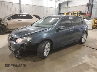 2014 Volkswagen Golf TDI w/Sunroof & Nav z VIN WVWDM7AJ7EW007070, wystawiony jako Copart lot #83086954 z przebiegiem 100 693 mil mil oraz Czysty tytuł • Clean title. Historia ofert i sprzedaży dostępna na DreamBid. Obrazek 1.