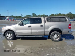 2004 Ford F-150 XLT with VIN 1FTPW12584KB15886, listed as a IAAI auction lot 41720147 with 226,881 mi miles. Bid and sale history available at carsss.com. Image 14.