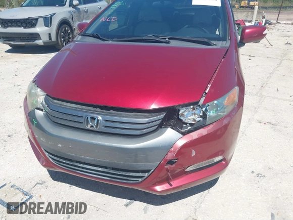 2010 Honda Insight EX with VIN JHMZE2H71AS021062, listed as a IAAI auction lot 41857350 with 45,558 mi miles and . Bid and sale history available at carsss.com. Image 6.