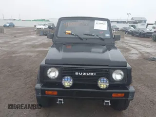 1986 Suzuki Samurai z VIN JS4JC51C4G4118117, wystawiony jako IAAI lot #41589925 z przebiegiem 70 607 mil mil oraz . Historia ofert i sprzedaży dostępna na DreamBid. Obrazek 10.