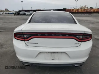 2015 Dodge Charger SXT z VIN 2C3CDXHG7FH721601, wystawiony jako Copart lot #58253925 z przebiegiem 123 004 mil mil oraz Szkoda całkowita • Salvage title. Historia ofert i sprzedaży dostępna na DreamBid. Obrazek 6.