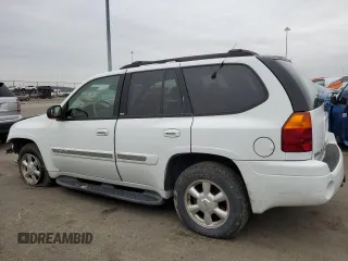 2003 GMC Envoy SLT with VIN 1GKDT13S332293112, listed as a Copart auction lot 43721225 with 139,471 mi miles and Salvage Title. Bid and sale history available at carsss.com. Image 2.