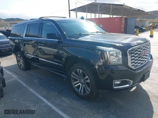 2018 GMC Yukon XL Denali with VIN 1GKS2HKJ1JR264188, listed as a IAAI auction lot 42076135 with 113,283 mi miles. Bid and sale history available at carsss.com. Image 1.