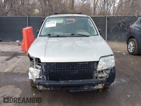 2005 Mercury Mariner Luxury z VIN 4M2YU57175DJ05986, wystawiony jako IAAI lot #41713180 z przebiegiem 243 682 mil mil oraz . Historia ofert i sprzedaży dostępna na DreamBid. Obrazek 12.
