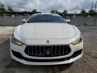 2019 Maserati Ghibli z VIN ZAM57XSA6K1334624, wystawiony jako Copart lot #86902164 z przebiegiem 47 862 mil mil oraz Nie do naprawy • Non repairable. Historia ofert i sprzedaży dostępna na DreamBid. Obrazek 5.