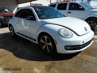 2012 Volkswagen Beetle 2.0T Turbo PZEV with VIN 3VW4A7AT6CM648540, listed as a IAAI auction lot 41326503 with 118,929 mi miles. Bid and sale history available at carsss.com. Image 1.
