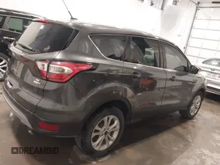 2017 Ford Escape SE z VIN 1FMCU9GD6HUC10553, wystawiony jako IAAI lot #42174098 z przebiegiem 101 243 mil mil oraz . Historia ofert i sprzedaży dostępna na DreamBid. Obrazek 14.