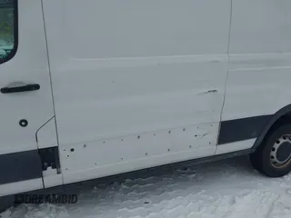 2016 Ford Transit Cargo z VIN 1FTYR2CM2GKA98918, wystawiony jako IAAI lot #41456987 z przebiegiem 51 290 mil mil oraz . Historia ofert i sprzedaży dostępna na DreamBid. Obrazek 6.
