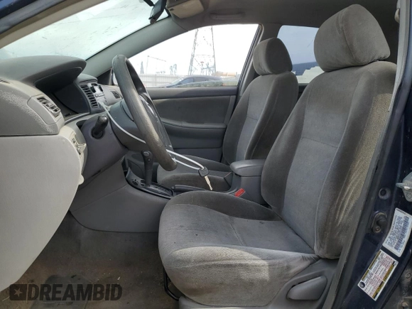 2004 Toyota Corolla CE with VIN 1NXBR32E04Z318235, listed as a Copart auction lot 55072815 with 299,999 mi miles and Clean Title. Bid and sale history available at DreamBid. Image 7.