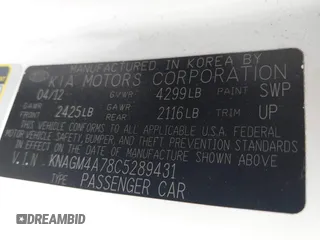 2012 Kia Optima LX with VIN KNAGM4A78C5289431, listed as a IAAI auction lot 42026917 with 148,867 mi miles and . Bid and sale history available at carsss.com. Image 9.