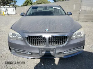 2014 BMW 7 Series 740i with VIN WBAYA6C55ED144487, listed as a Copart auction lot 77044014 with 86,149 mi miles and Salvage Title. Bid and sale history available at carsss.com. Image 5.