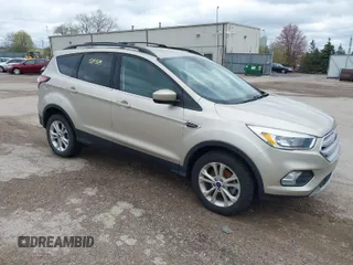 2018 Ford Escape SE with VIN 1FMCU0GD5JUA72876, listed as a IAAI auction lot 42095838 with 111,173 mi miles. Bid and sale history available at carsss.com. Image 1.