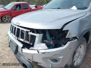 2014 Jeep Grand Cherokee Laredo with VIN 1C4RJFAG7EC243121, listed as a IAAI auction lot 41925695 with 147,999 mi miles. Bid and sale history available at carsss.com. Image 6.