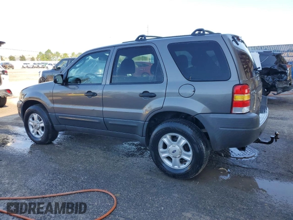 2004 Ford Escape XLT with VIN 1FMYU03154KA96127, listed as a Copart auction lot 71851434 with 168,773 mi miles and Salvage Title. Bid and sale history available at carsss.com. Image 2.