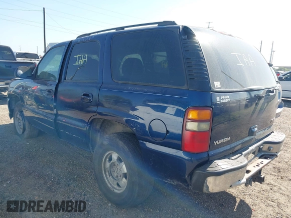 2003 GMC Yukon SLT with VIN 1GKEC13V13R212713, listed as a IAAI auction lot 42015270 with 1 mi miles. Bid and sale history available at carsss.com. Image 3.