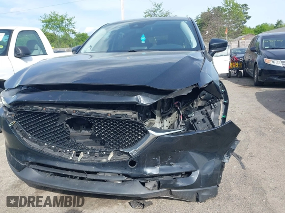 2018 Mazda CX-5 Touring z VIN JM3KFBCM9J0358997, wystawiony jako IAAI lot #42332606 z przebiegiem 93 952 mil mil oraz . Historia ofert i sprzedaży dostępna na DreamBid. Obrazek 17.