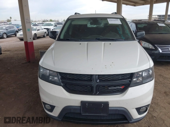 2019 Dodge Journey SE with VIN 3C4PDCBB7KT797842, listed as a IAAI auction lot 42036147 with 163,919 mi miles and . Bid and sale history available at DreamBid. Image 6.