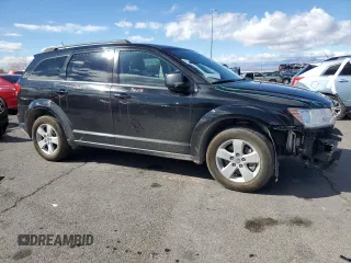 2017 Dodge Journey SE with VIN 3C4PDCAB3HT523810, listed as a Copart auction lot 48036165 with 119,333 mi miles and Salvage Title. Bid and sale history available at DreamBid. Image 4.