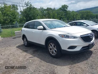 2015 Mazda CX-9 Sport with VIN JM3TB3BV8F0461772, listed as a IAAI auction lot 42761424 with 176,553 mi miles and . Bid and sale history available at DreamBid. Image 1.