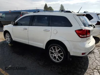 2016 Dodge Journey R/T with VIN 3C4PDDFG1GT116884, listed as a Copart auction lot 54901495 with 239,736 mi miles and Clean title. Bid and sale history available at DreamBid. Image 2.