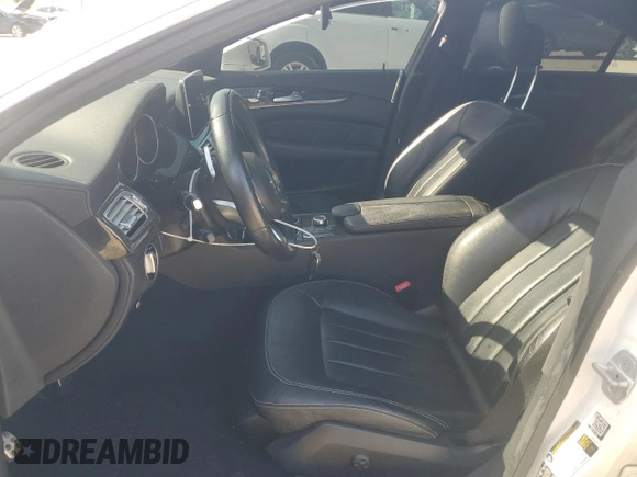 2016 Mercedes-Benz CLS 400 with VIN WDDLJ6FB2GA168531, listed as a Copart auction lot 52477305 with 113,716 mi miles and Salvage title. Bid and sale history available at DreamBid. Image 7.