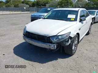 2016 Ford Taurus Limited with VIN 1FAHP2F88GG109434, listed as a IAAI auction lot 41894027 with 220,313 mi miles and . Bid and sale history available at DreamBid. Image 6.