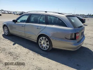 2005 Mercedes-Benz E 500 with VIN WDBUH83J35X168838, listed as a Copart auction lot 69885014 with 203,187 mi miles and Salvage Title. Bid and sale history available at carsss.com. Image 2.