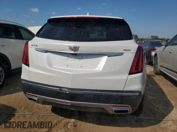 2024 Cadillac XT5 FWD Premium Luxury with VIN 1GYKNCRSXRZ720148, listed as a Copart auction lot 75116124 with 0 mi miles and Non Repairable. Bid and sale history available at carsss.com. Image 6.