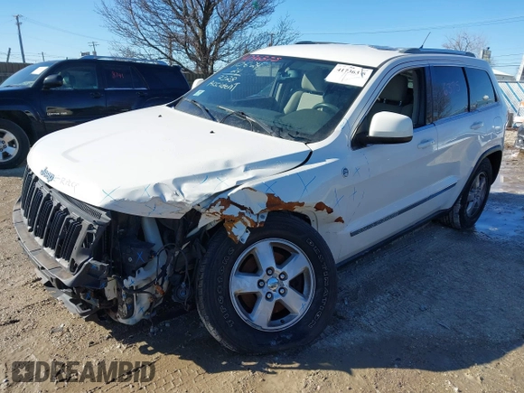 2012 Jeep Grand Cherokee Laredo with VIN 1C4RJFAGXCC224138, listed as a IAAI auction lot 41736375 with 133,383 mi miles. Bid and sale history available at carsss.com. Image 18.