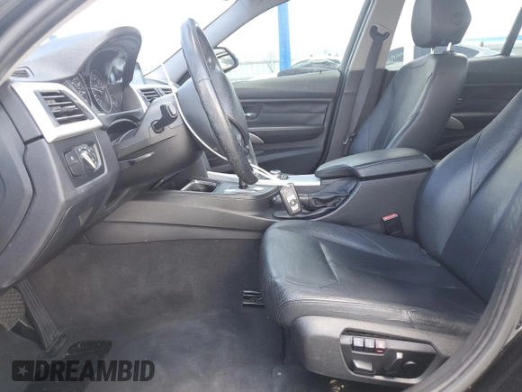 2012 BMW 3 Series 328i with VIN WBA3A5G55CNN65681, listed as a Copart auction lot 61018025 with 156,903 mi miles and Salvage title. Bid and sale history available at DreamBid. Image 7.