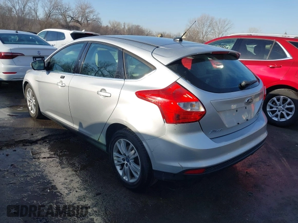 2012 Ford Focus SEL with VIN 1FAHP3M22CL413512, listed as a IAAI auction lot 41758125 with 161,857 mi miles. Bid and sale history available at carsss.com. Image 3.