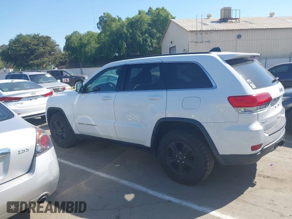2014 Jeep Grand Cherokee Laredo with VIN 1C4RJFAG9EC334021, listed as a IAAI auction lot 42128823 with 161,741 mi miles. Bid and sale history available at carsss.com. Image 14.