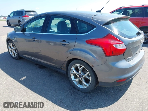 2014 Ford Focus Titanium with VIN 1FADP3N22EL317007, listed as a IAAI auction lot 42641134 with 159,705 mi miles and . Bid and sale history available at DreamBid. Image 3.