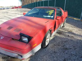 1985 Pontiac Firebird Trans Am with VIN 1G2FW87H3FN208733, listed as a IAAI auction lot 41705988 with 87,906 mi miles. Bid and sale history available at carsss.com. Image 6.
