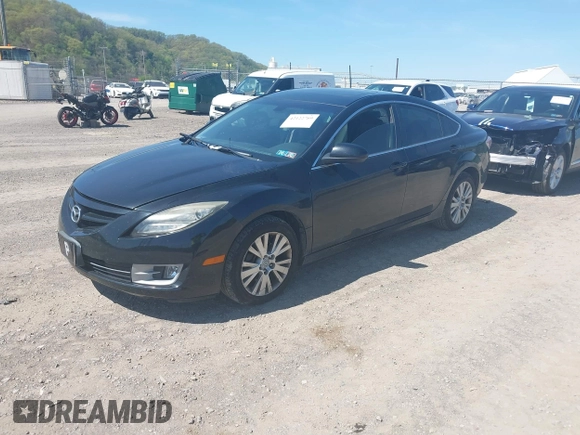 2009 Mazda 6 i Touring with VIN 1YVHP82A395M16573, listed as a IAAI auction lot 42122769 with 137,763 mi miles and . Bid and sale history available at carsss.com. Image 2.