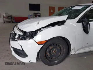 2016 Honda Civic Sedan LX with VIN 19XFC2F59GE028056, listed as a IAAI auction lot 41875940 with 124,243 mi miles. Bid and sale history available at carsss.com. Image 6.